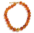 Circle resin beads amber (cadena)