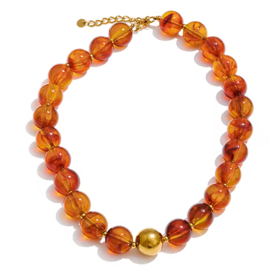 Circle resin beads amber (cadena)
