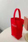 Bolso rojo CS LEWIS
