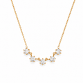 Delicate gold necklace with zircons