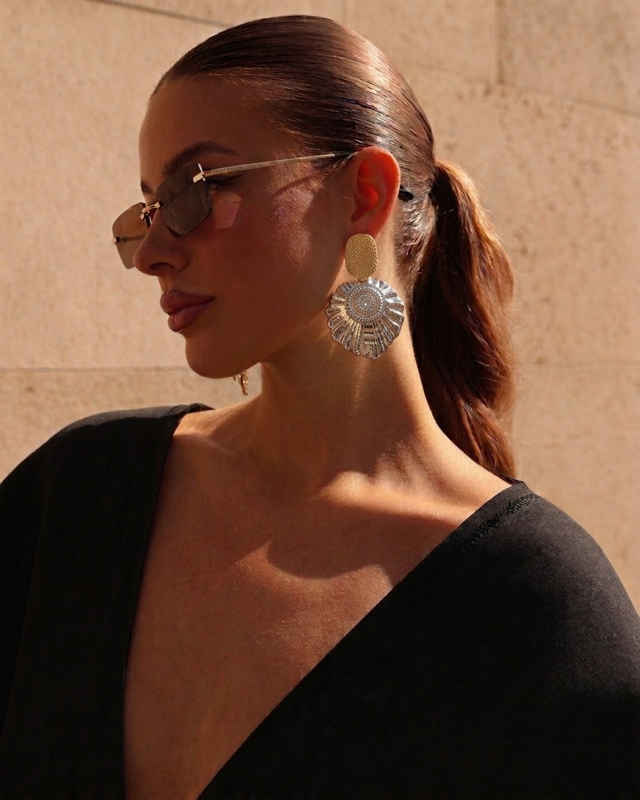Aretes de conchas y cowboy