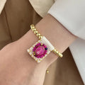 Pulsera de mostacilla con virgen color rosado