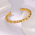 Pulsera enroscada dorada