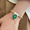 Pulsera de mostacilla con virgen color verde