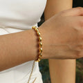 Pulsera topos dorados