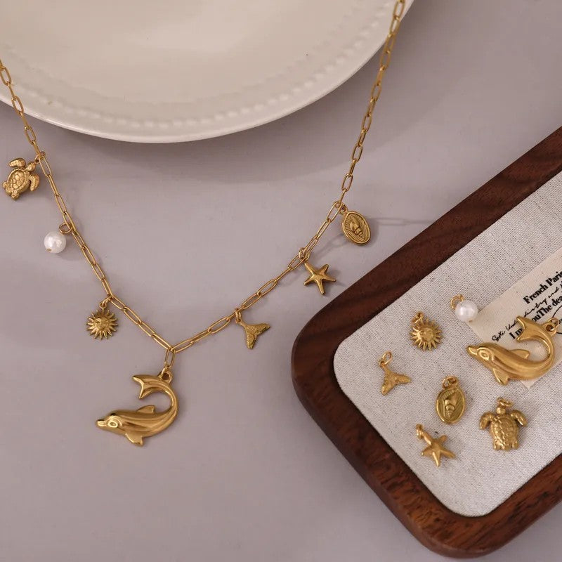 Cadena con dije de delfin